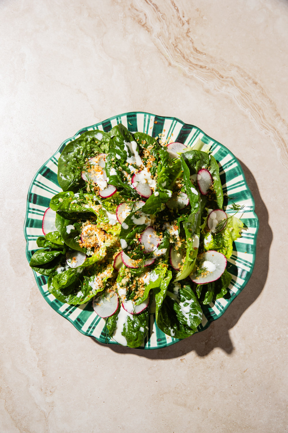 Lettuce and radish salad with feta and yoghurt dressing
