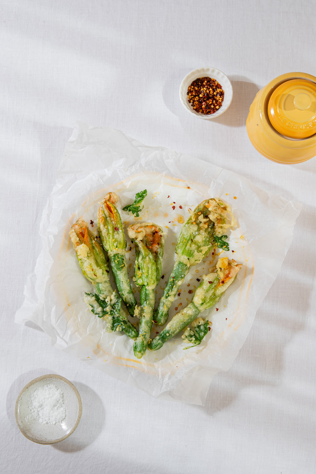 Fried zucchini flowers with honey, lemon and chilli