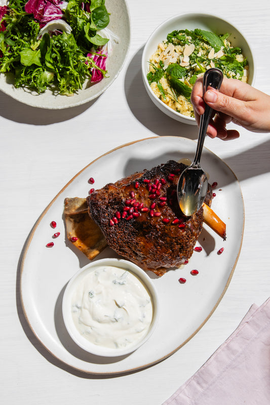 Pomegranate slow cooked lamb shoulder