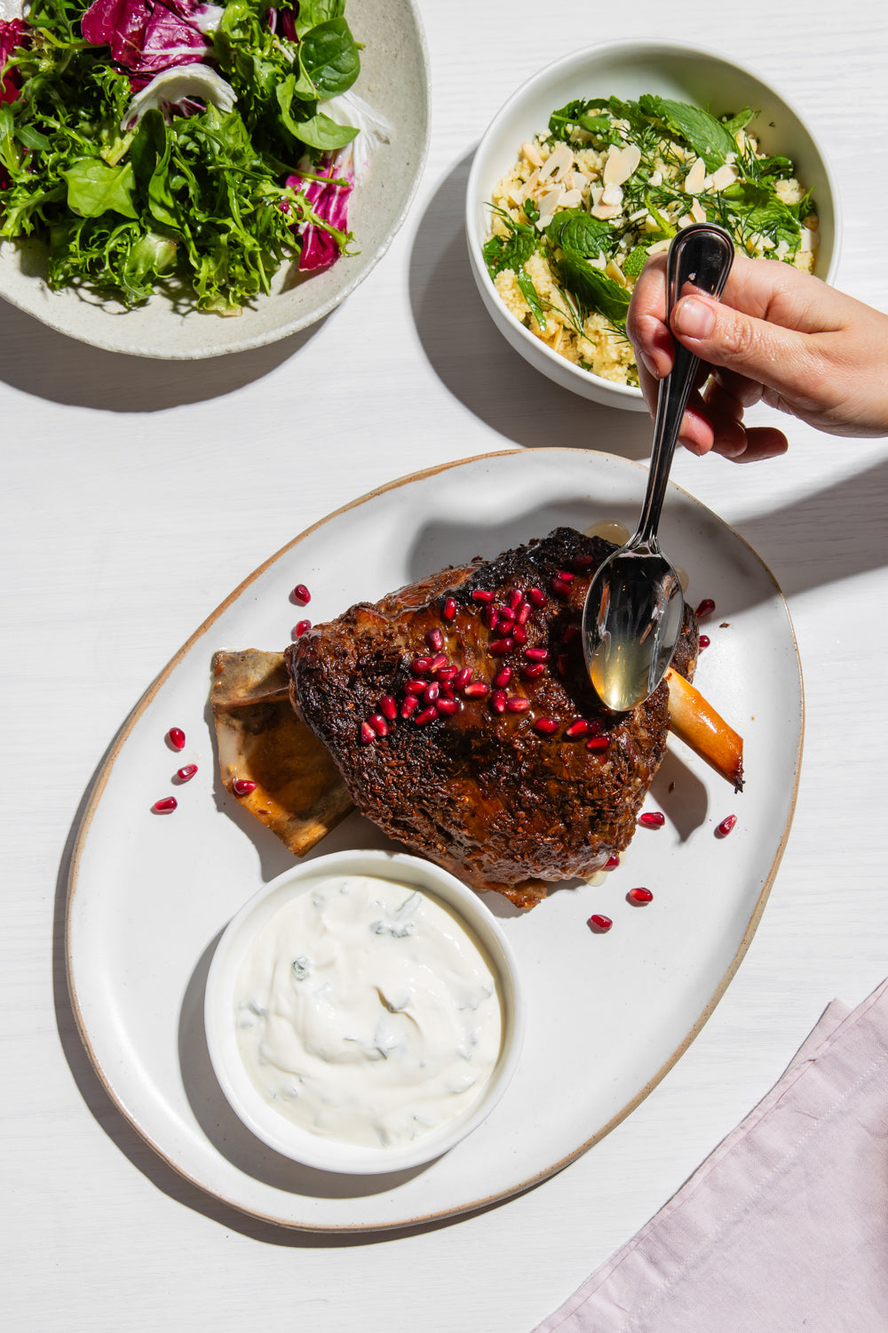 Pomegranate slow cooked lamb shoulder