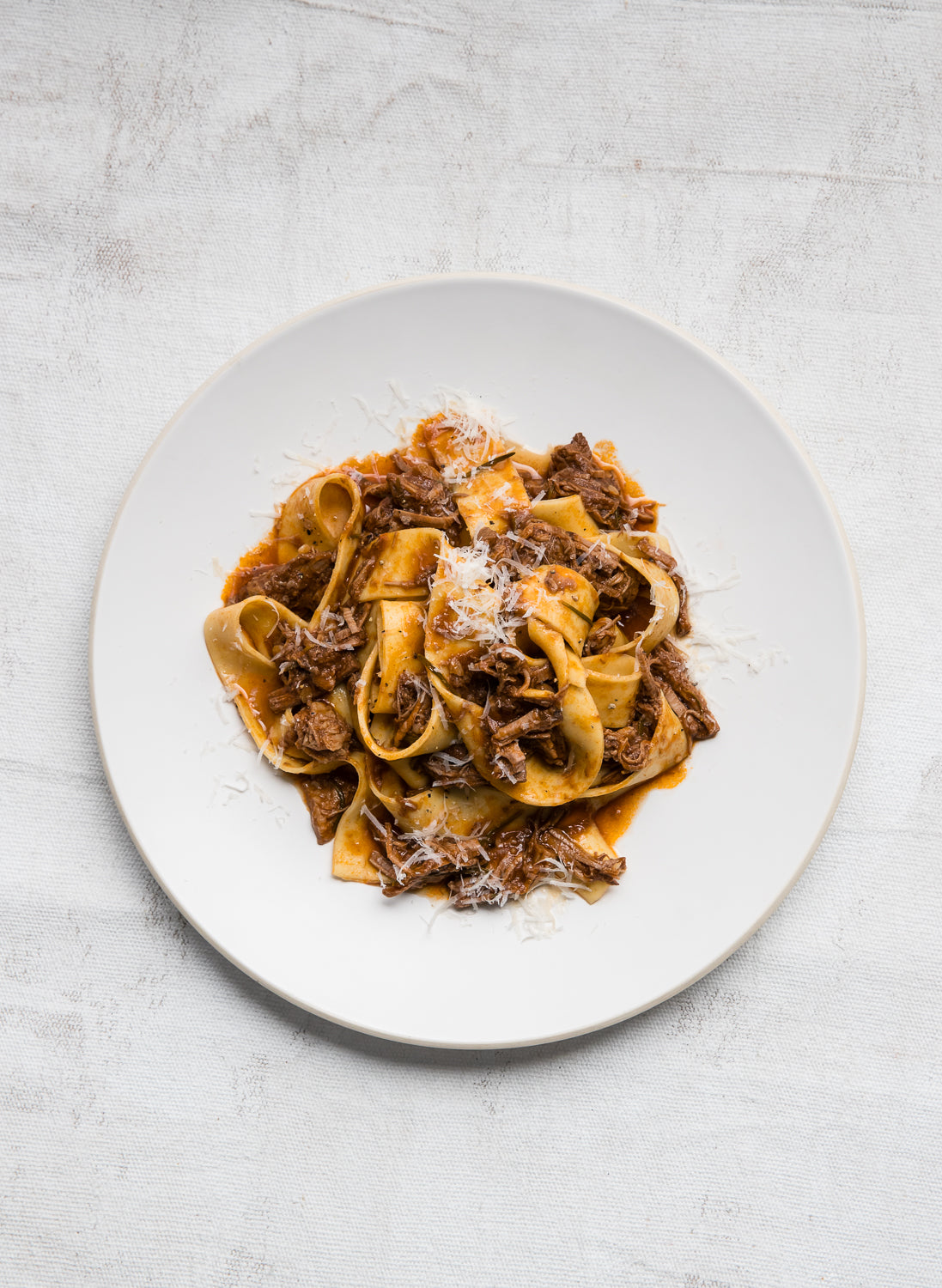 Slow-cooked pepper beef ragù