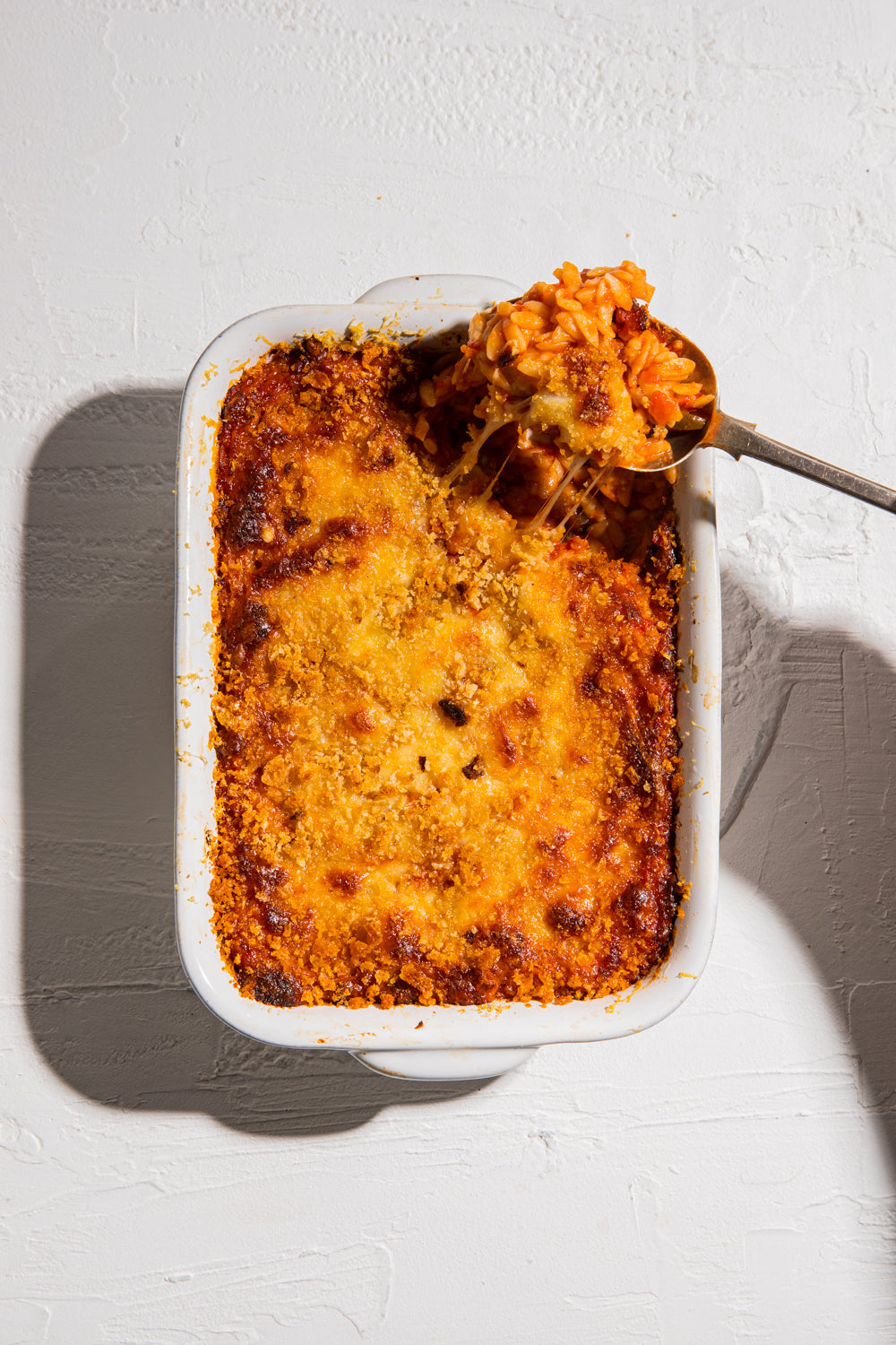 Tomato and olive risoni bake
