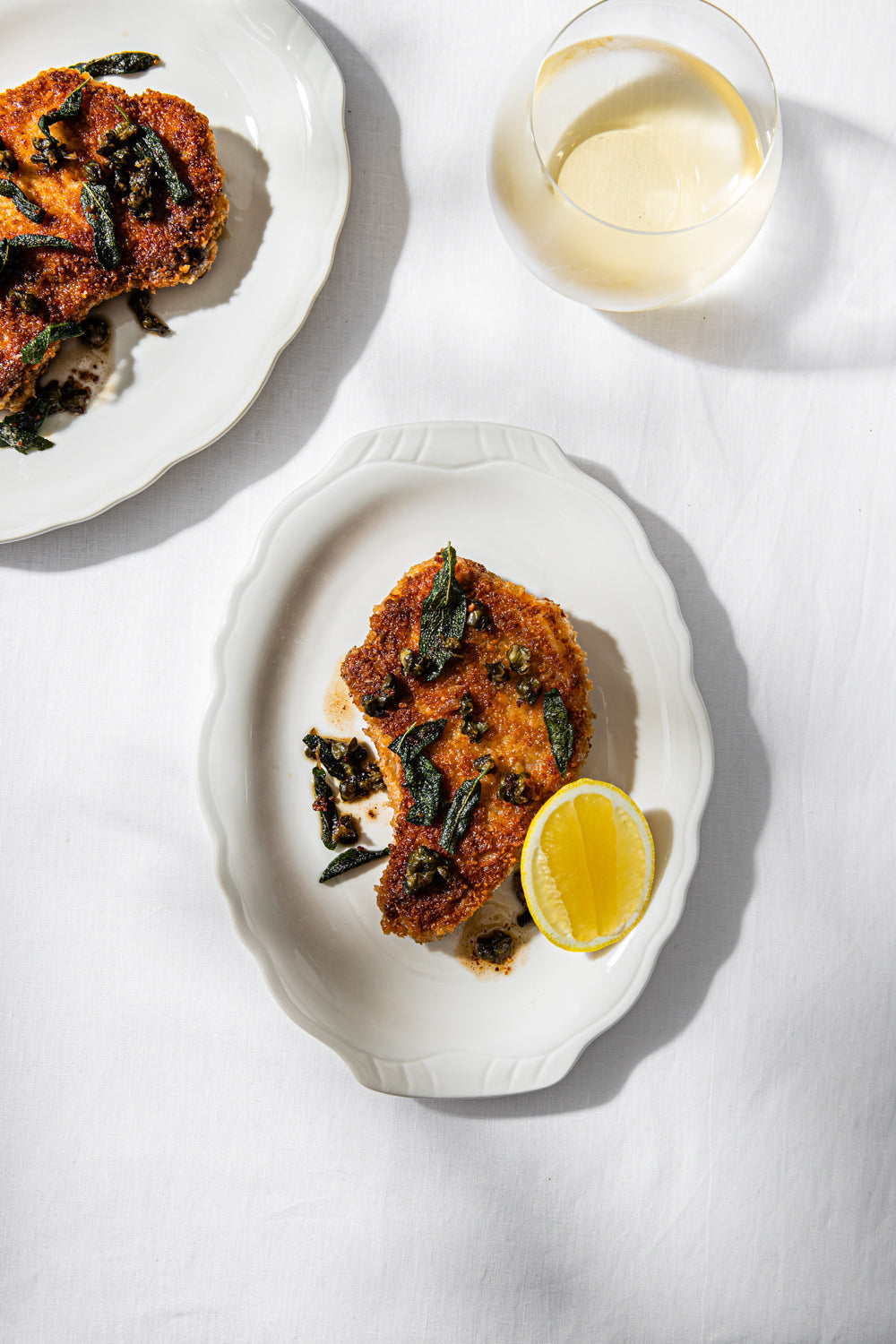 Pork cotoletta with burnt butter, capers & sage