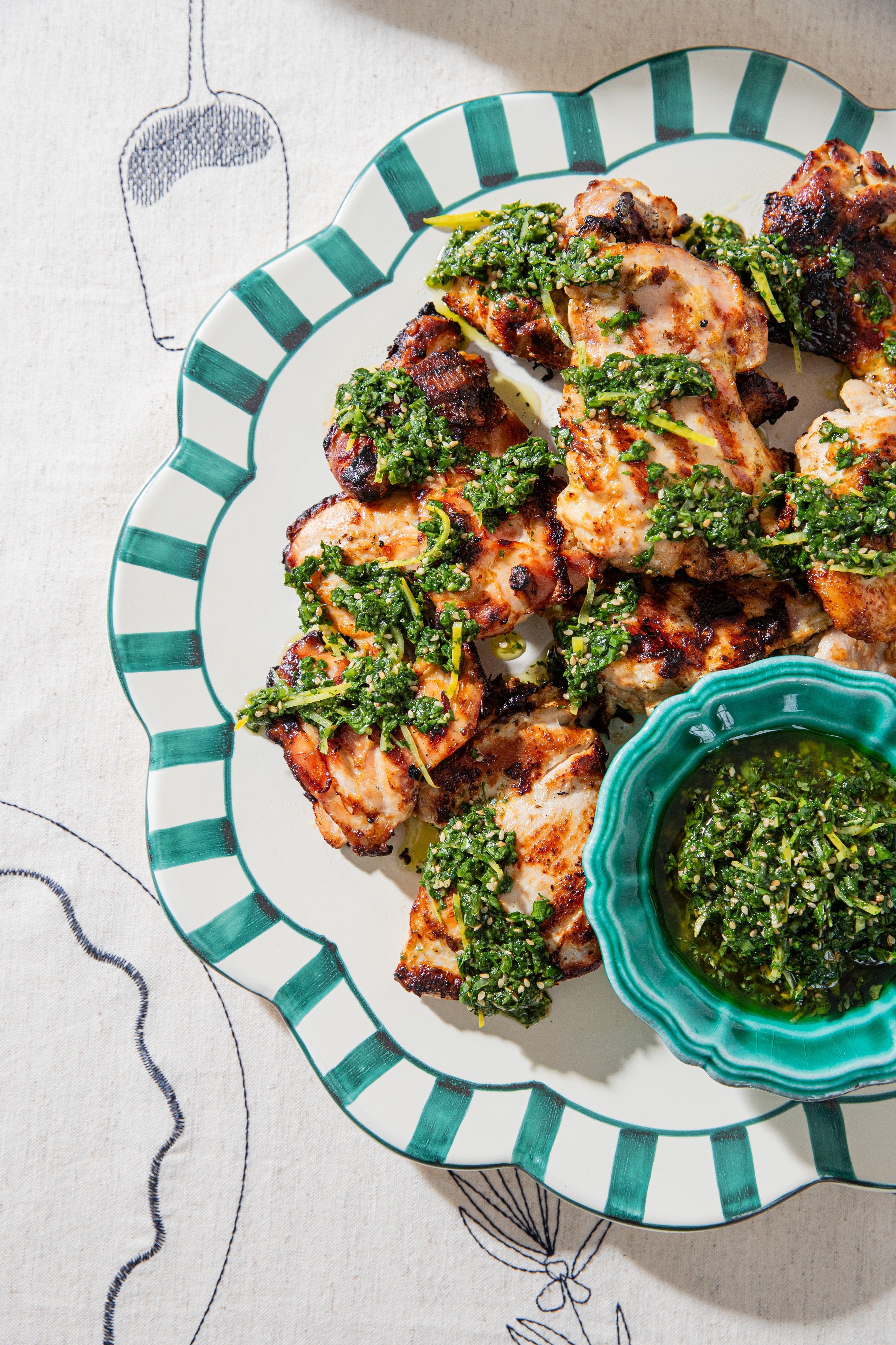Yoghurt and olive oil chicken thighs with green hero sauce