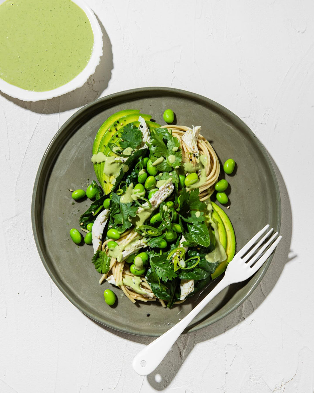 Chicken noodle salad with a fiery, zesty green sesame sauce