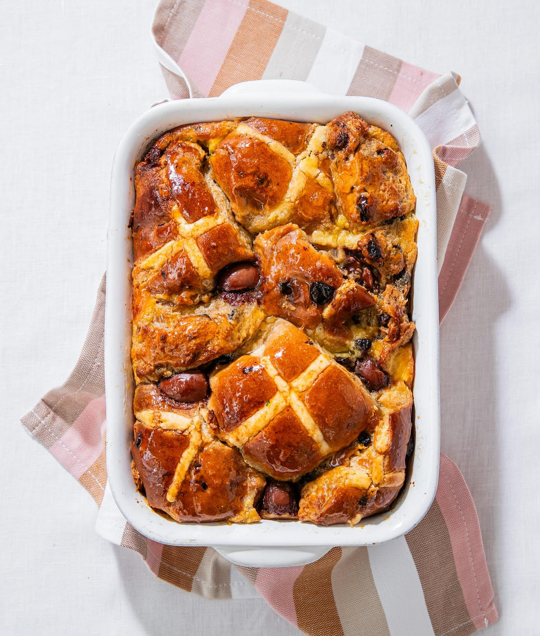 Hot cross bun bread and butter pudding