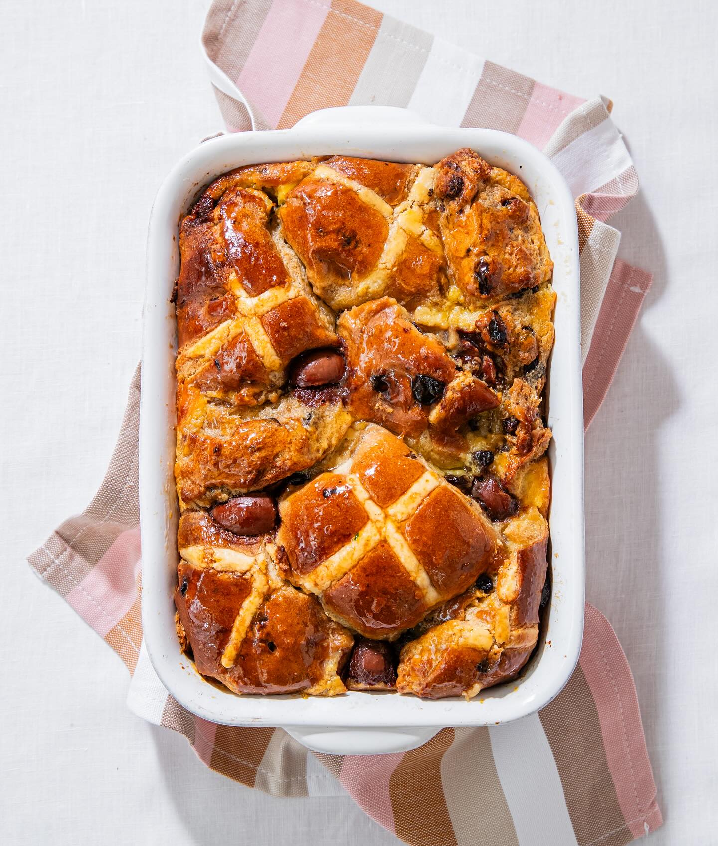 Hot cross bun bread and butter pudding