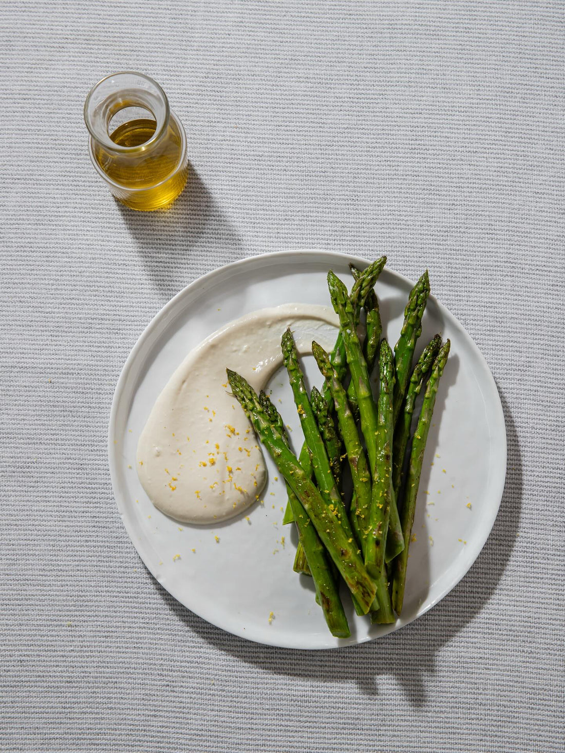 Grilled asparagus with whipped lemon and garlic tahini